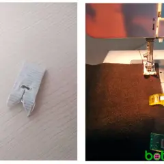 Máquina de coser trabajando sobre polipiel marrón, sujetada con clips.