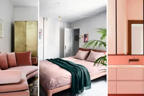 Sofá curvo rosa palo, cama con manta verde y baño moderno. Una paleta que sabe combinar rojo y rosa palo con elegancia.
