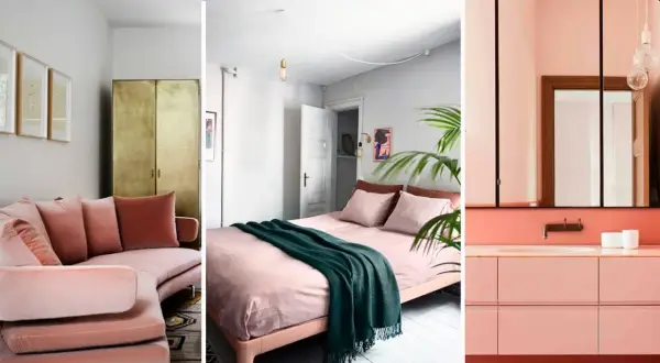 Sofá curvo rosa palo, cama con manta verde y baño moderno. Una paleta que sabe combinar rojo y rosa palo con elegancia.