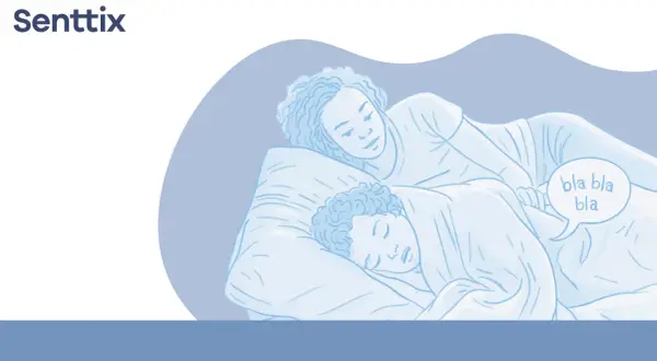 Una pareja duerme abrazada. Uno de ellos habla en sueños, diciendo "bla bla bla", quizás explicando por que se habla en sueños.
