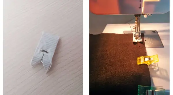 Máquina de coser trabajando sobre polipiel marrón, sujetada con clips.