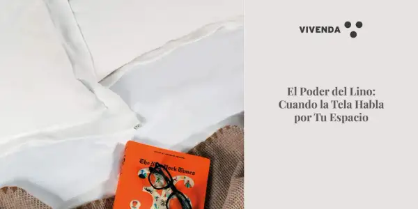Suavidad y elegancia en blanco. El lino, protagonista de un espacio acogedor, junto a un libro y gafas.